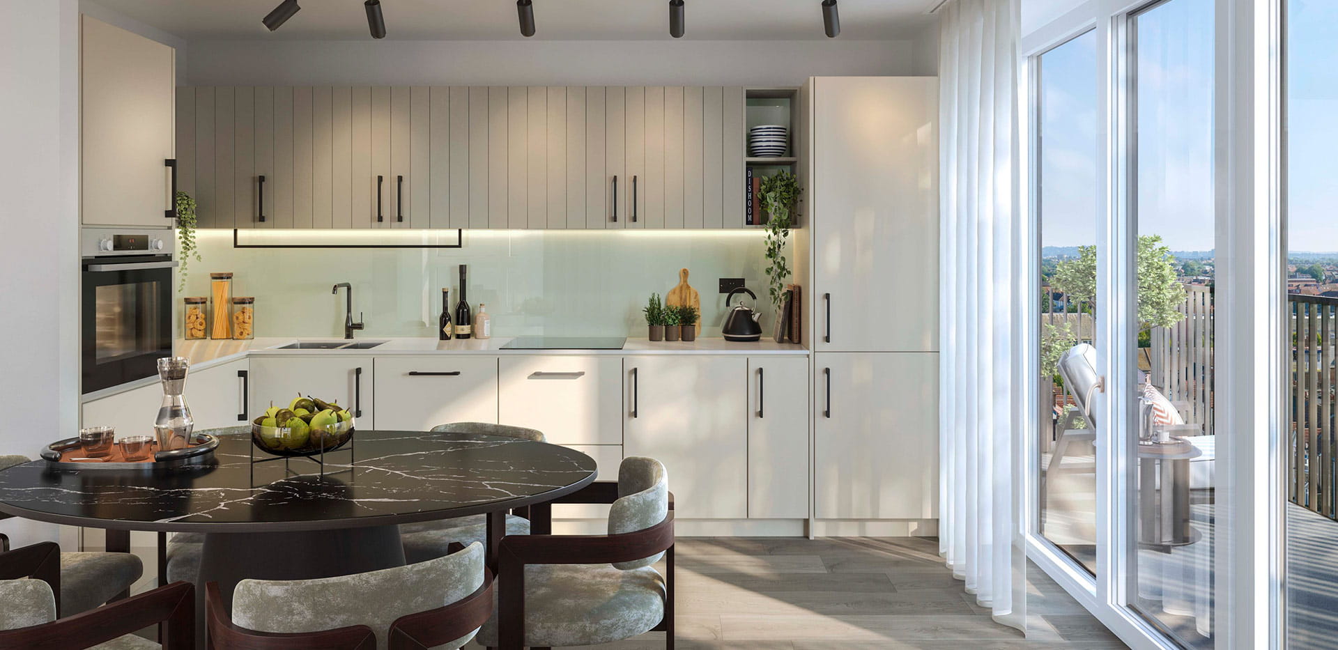 A light-themed kitchen image from a show apartment at Quarter Yards