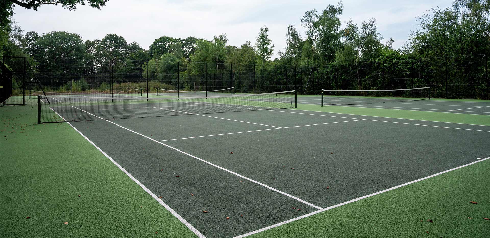 An exterior photograph of the Tennis Court