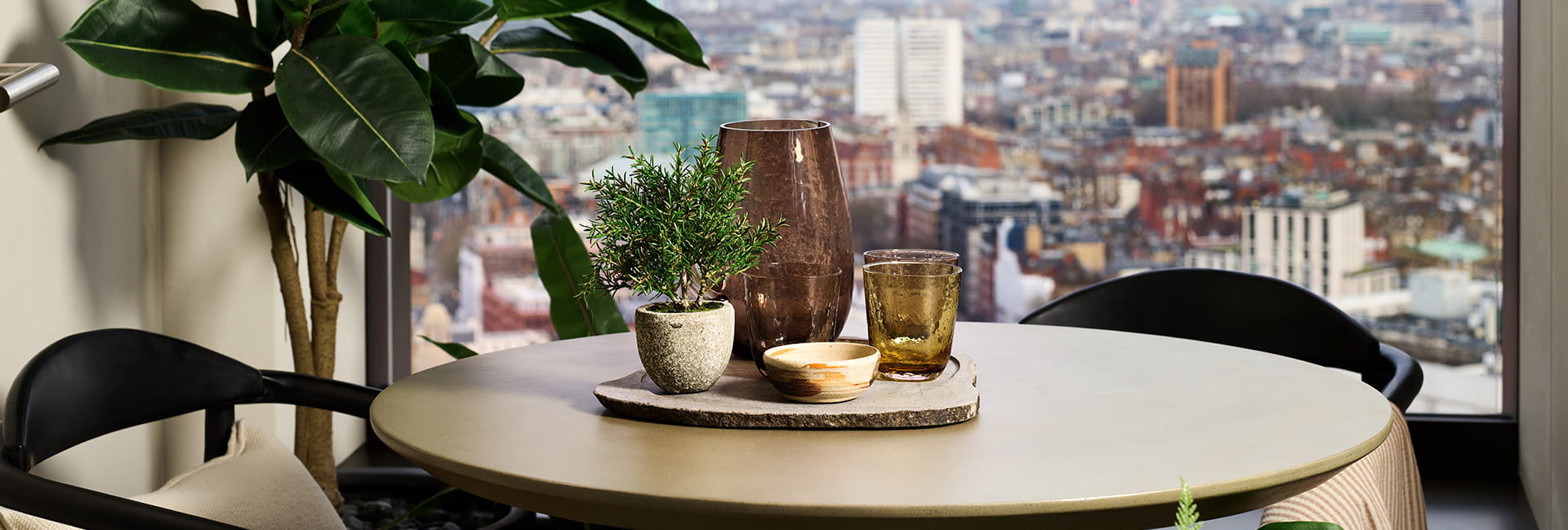 An interior photograph of Dining area with view of London from Trillium
