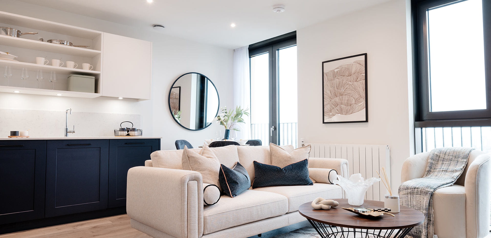 Living area with cream sofas