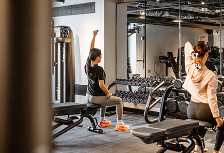 An image of people working out in the gym