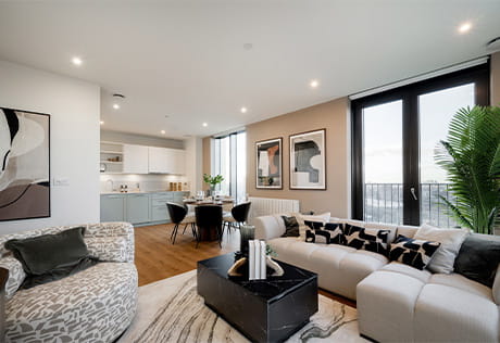 An open-plan image showing the living/kitchen/dining area of a showhome at TwelveTrees Park