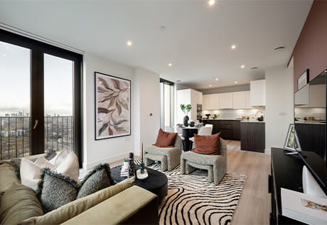 An open-plan image showing the living/kitchen/dining area of a showhome at TwelveTrees Park