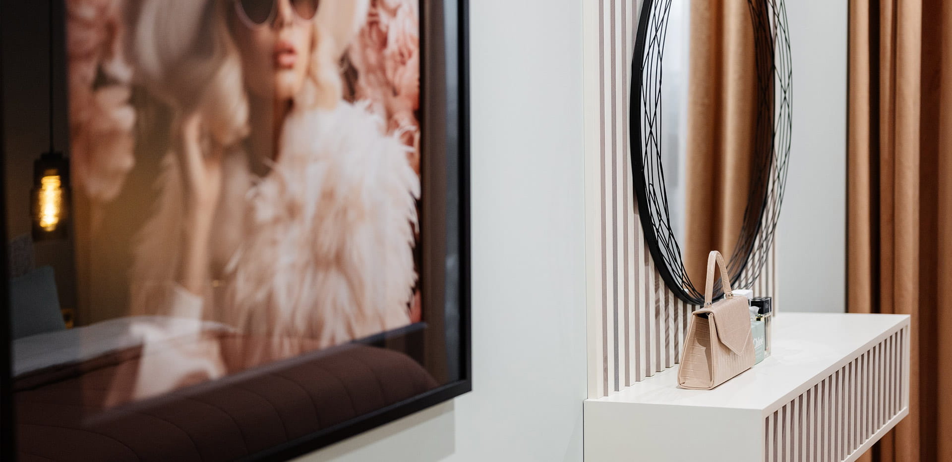 An interior Bedroom table and mirror at TwelveTrees Park