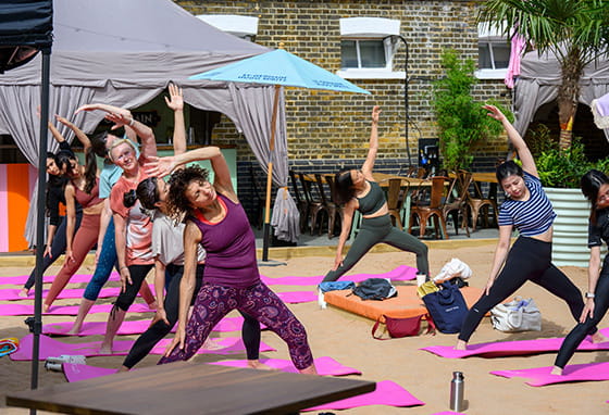 An image of people doing Yoga at Wandsworth Mills