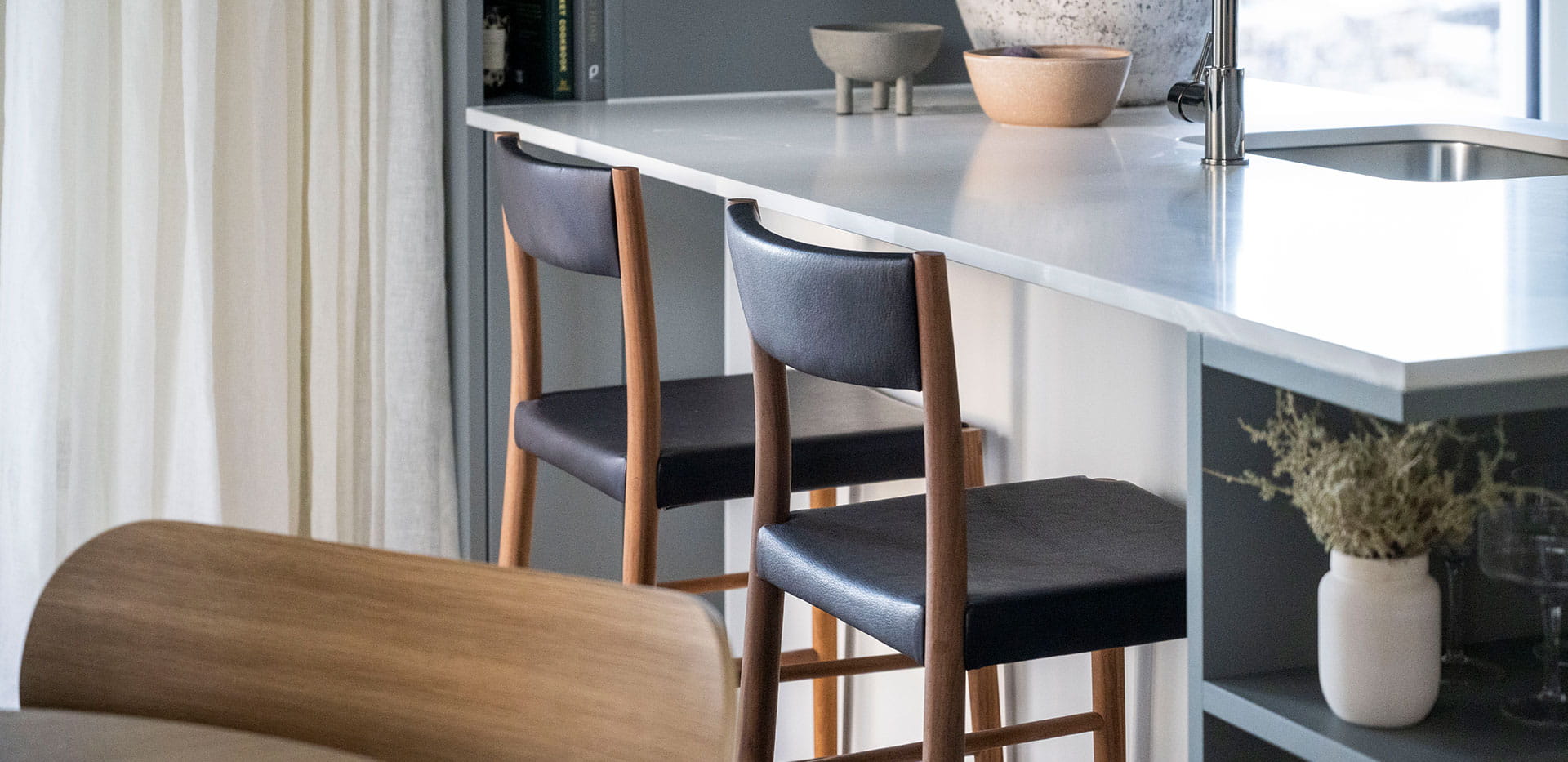 A close up of the Kitchen island in the Showhome at White City Living