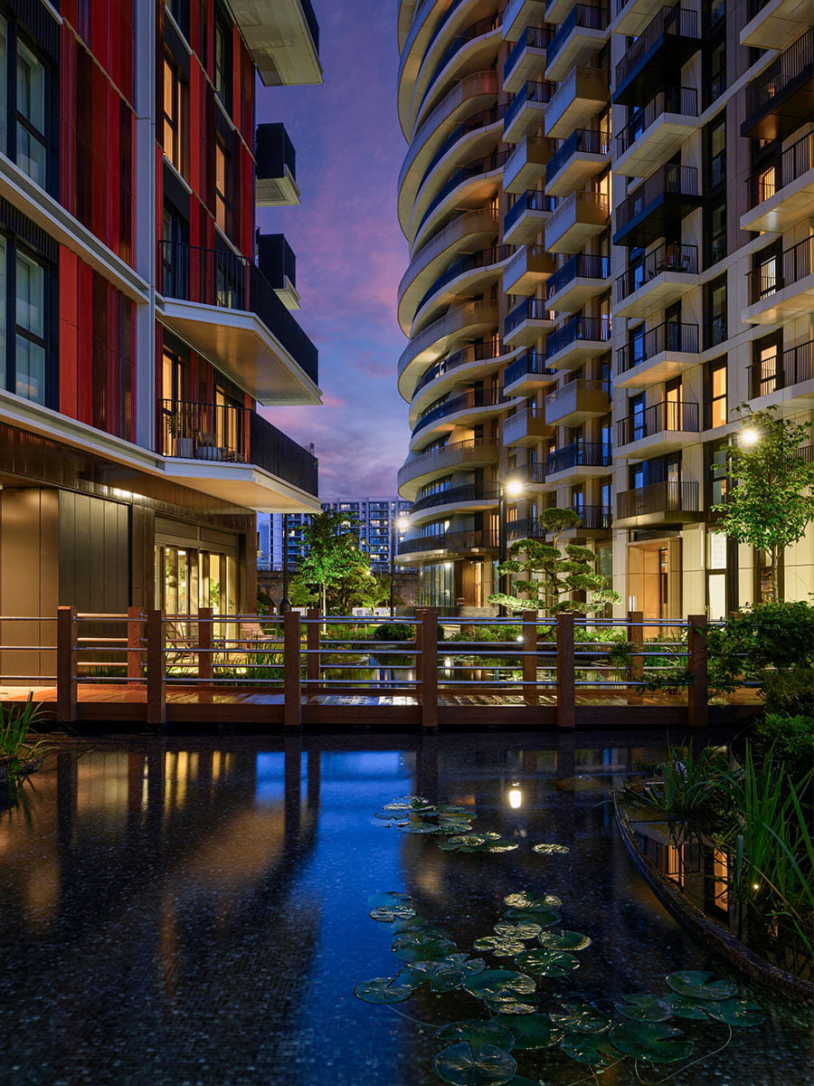An exterior image of White City Living at night