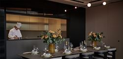 Resident's Facilities - picture of private dining area with head chef overlooking the dining table