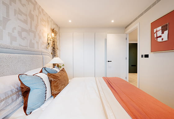 An interior bedroom image within a showhome at White City Living