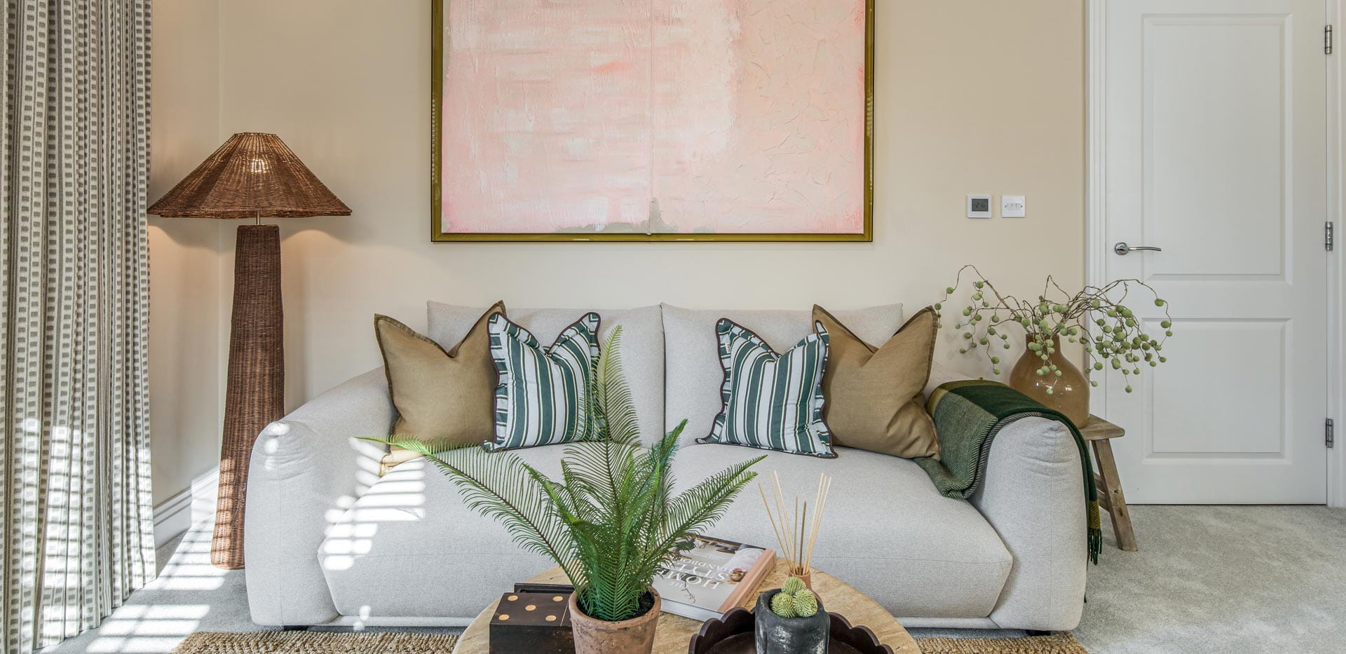 Living space sofa and coffee table with wall hanging