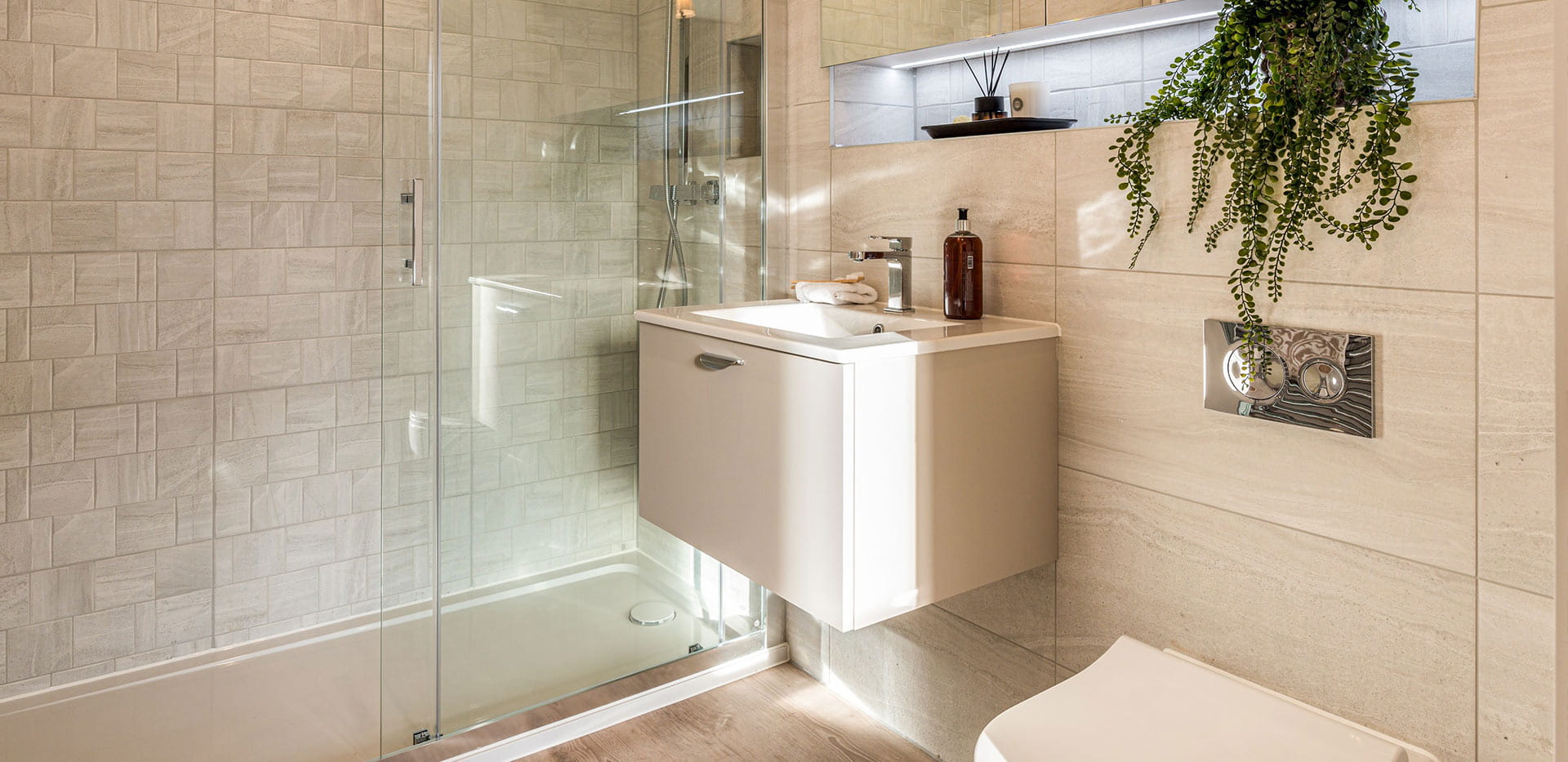 4 bedroom showhome bathroom with a bath, basin and above basin display