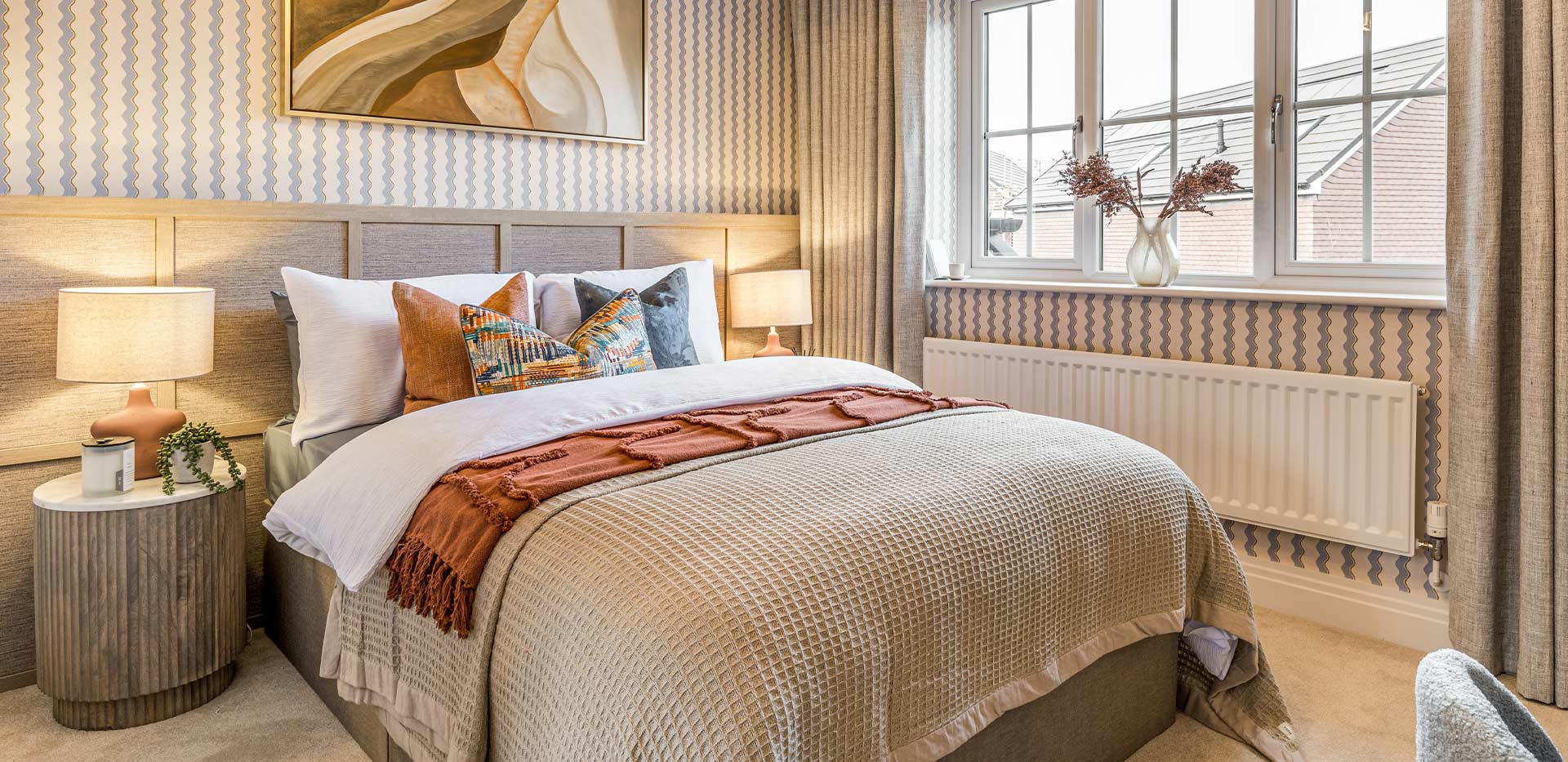 4 bedroom showhome neutral design bedroom that overlooks the development 