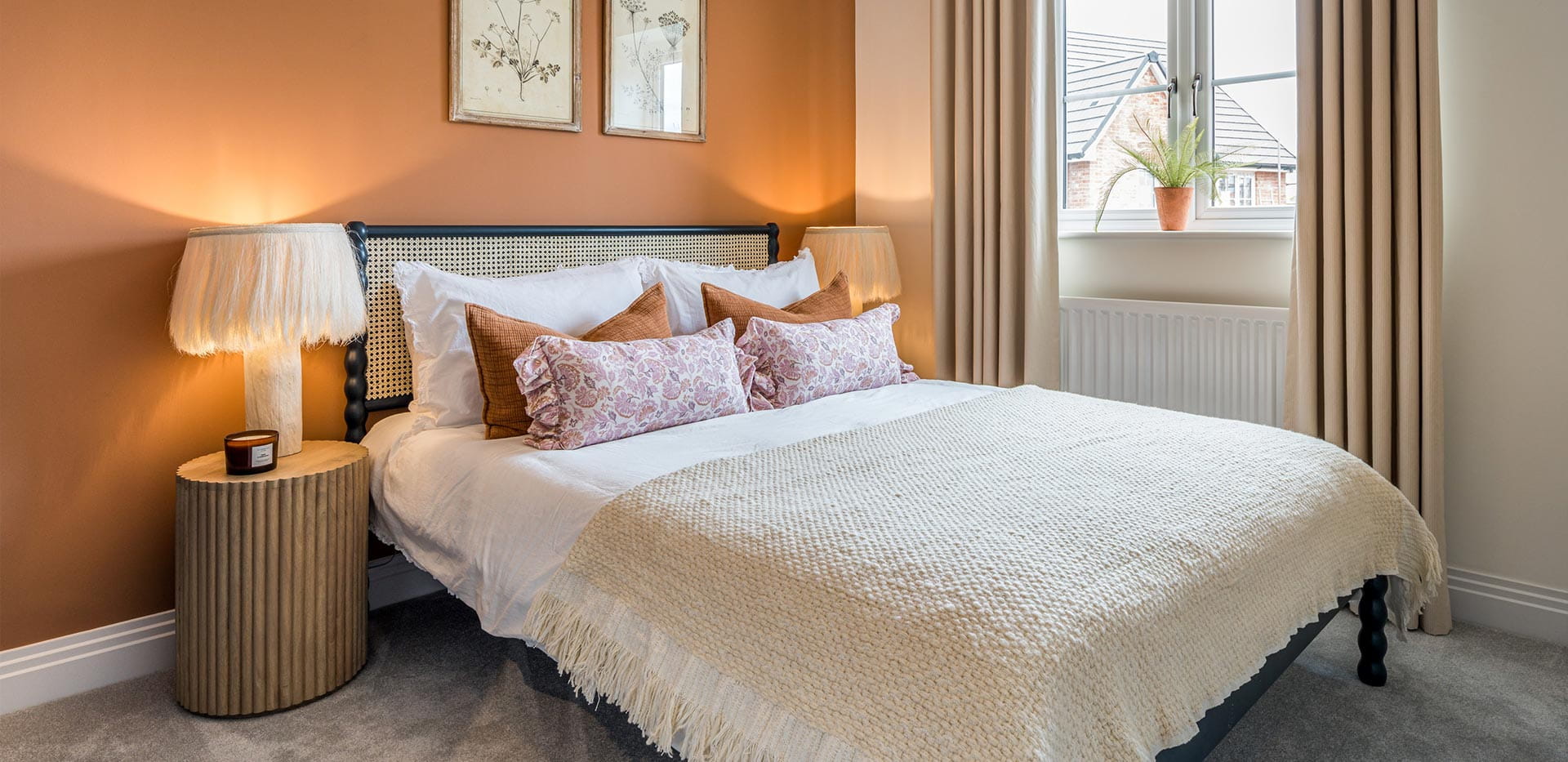 An interior Bathroom with Orange feature wall at Winterbrook Meadows