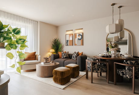 Modern designed living space with dining table adjacent