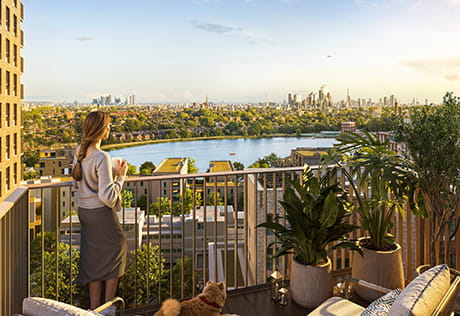 An exterior CGI of Woodberry Down with views over London