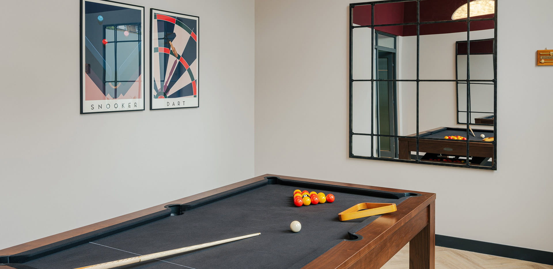 A games room with a pool table at Woodberry Down