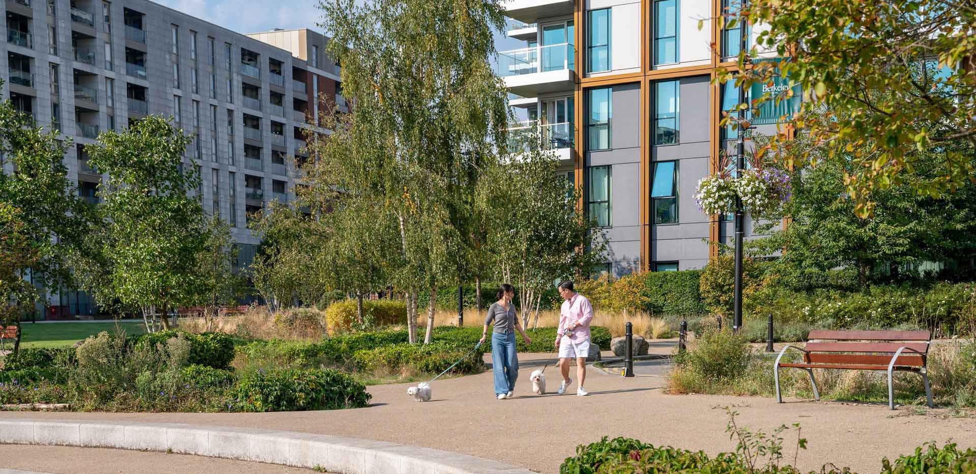CGI of pedestrianised, landscaped greenery recreational space next to new build development.