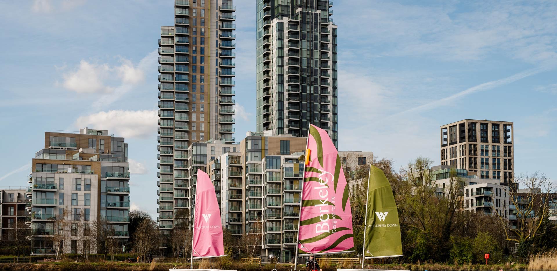 Boats with Berkeley branding and logos on their sails.