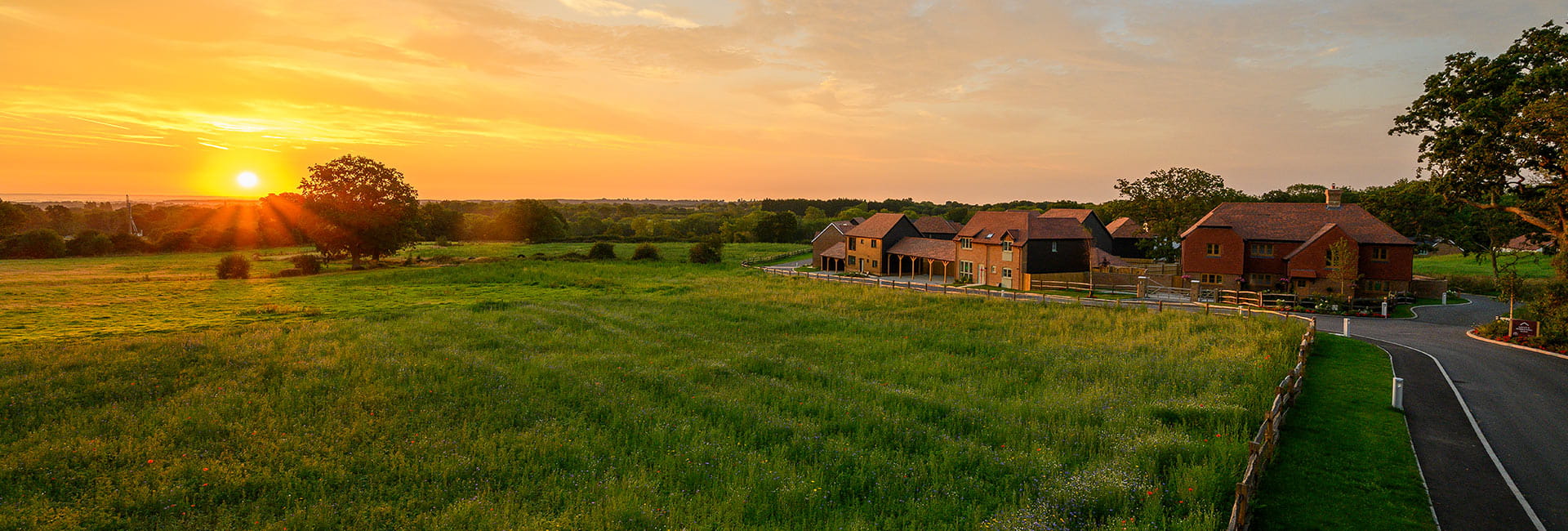External Image of Farmstead against a beautiful Sunset