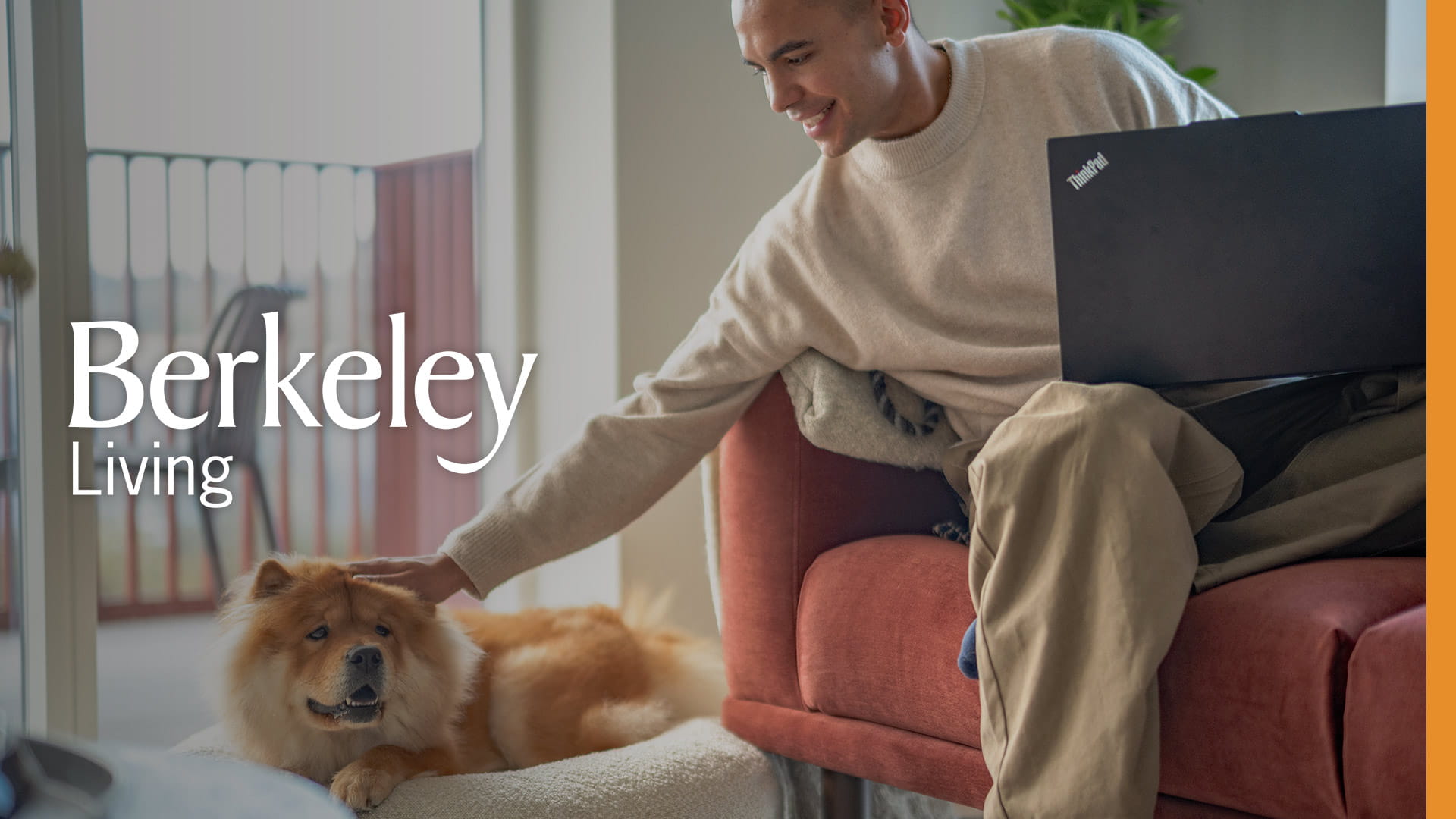 An image of a man petting his dog in his new rented home