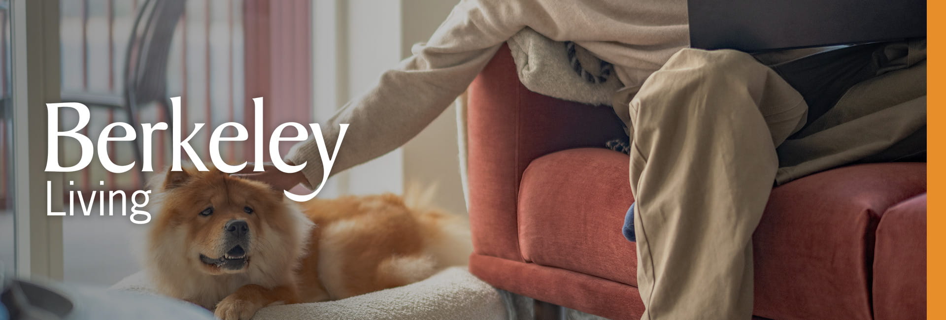 An image of a man petting his dog in his new rented home