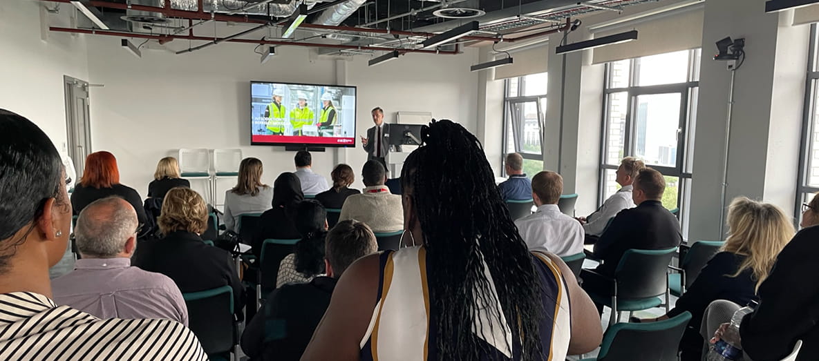People sitting in a presentation on the T-Level Insights Day