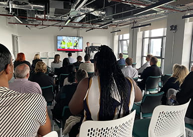 People sitting in a presentation on the T-Level Insights Day