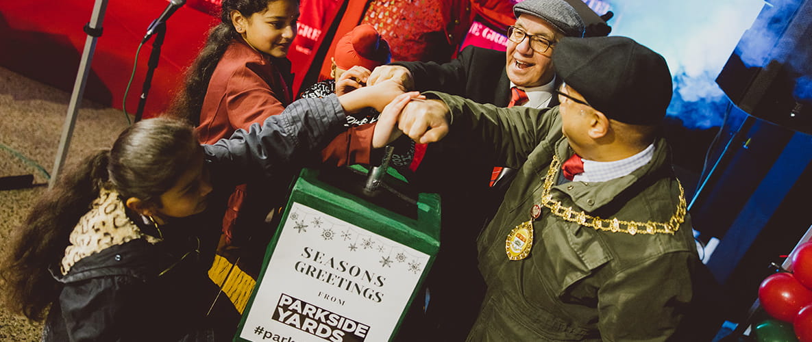 Mayor celebrating at The Green Quarter Christmas market