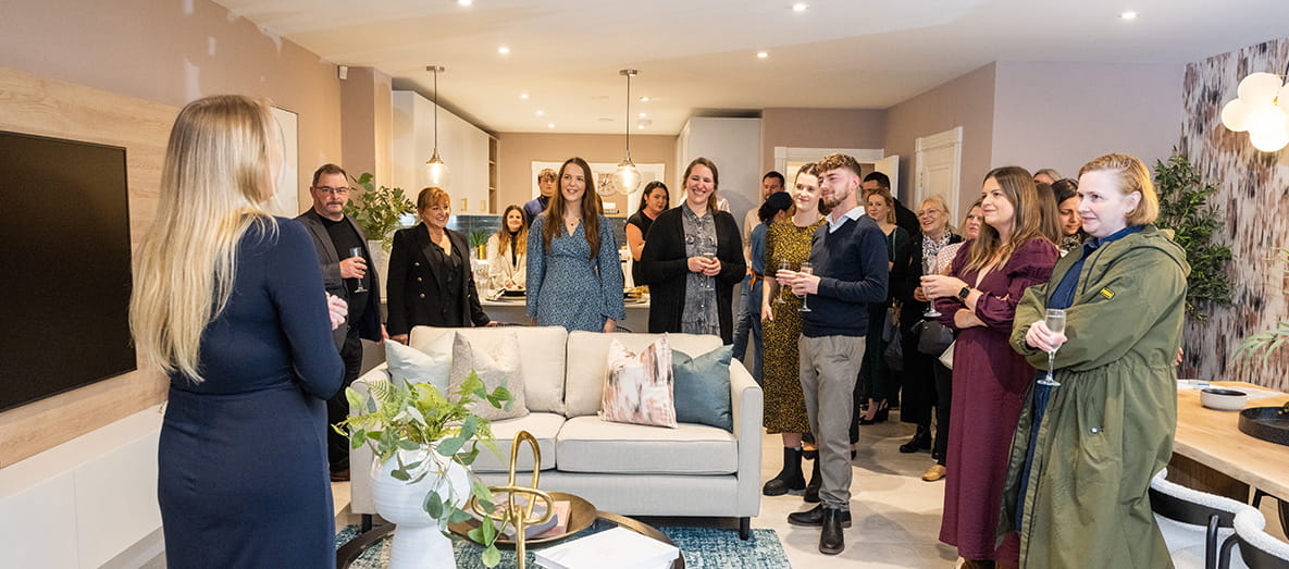 People having a conversation at the networking event