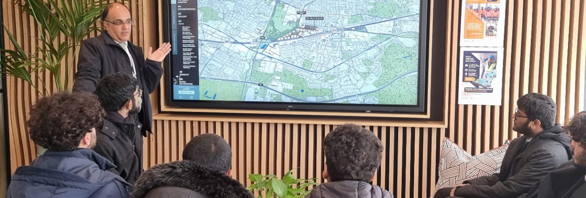 A Shot of the Open Doors Event inside looking at the development plan