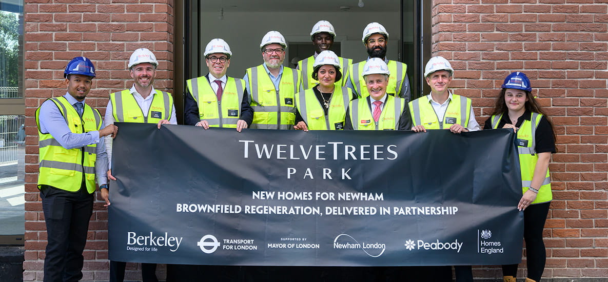 Image of Rob Perrins and Berkeley Staff celebrating New Homes for Newham