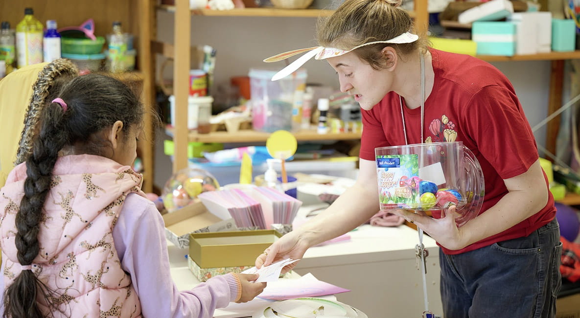 An image of children creating Easter Bonnets at an Easter Event at The Green Quarter