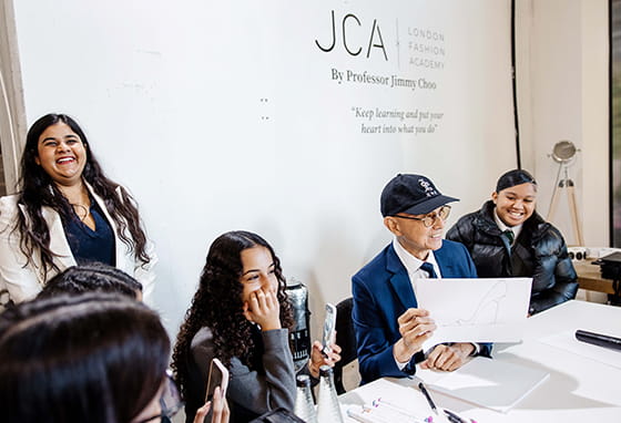 Fulham Cross School students listening to insights from Prof. Jimmy Choo