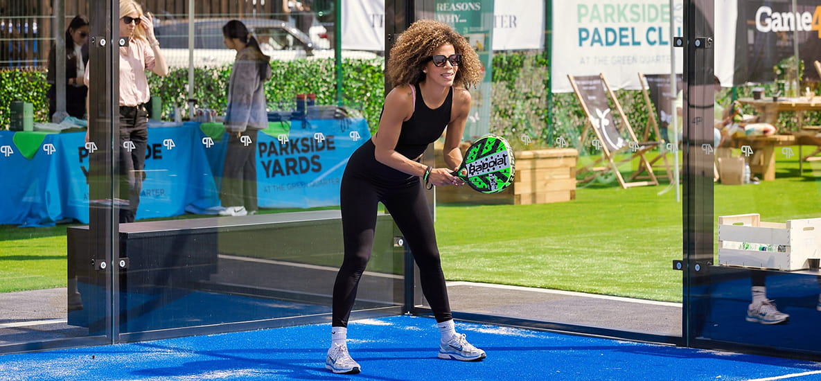 An image of a women playing Padel