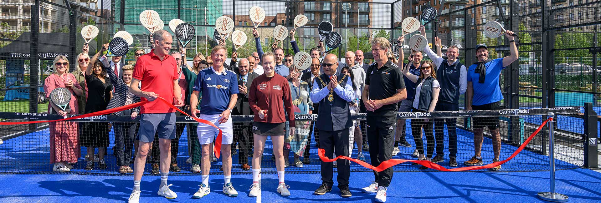 An image of a bunch of people celebrating the opening of the Padel Courts