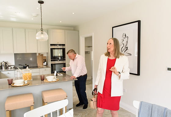 An image of people having a look through the Oakhill Summer Home