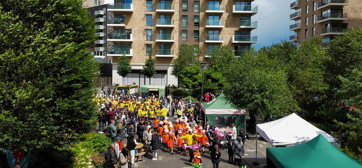 Image of the community carnival in full swing with Kidbrooke Village in the background