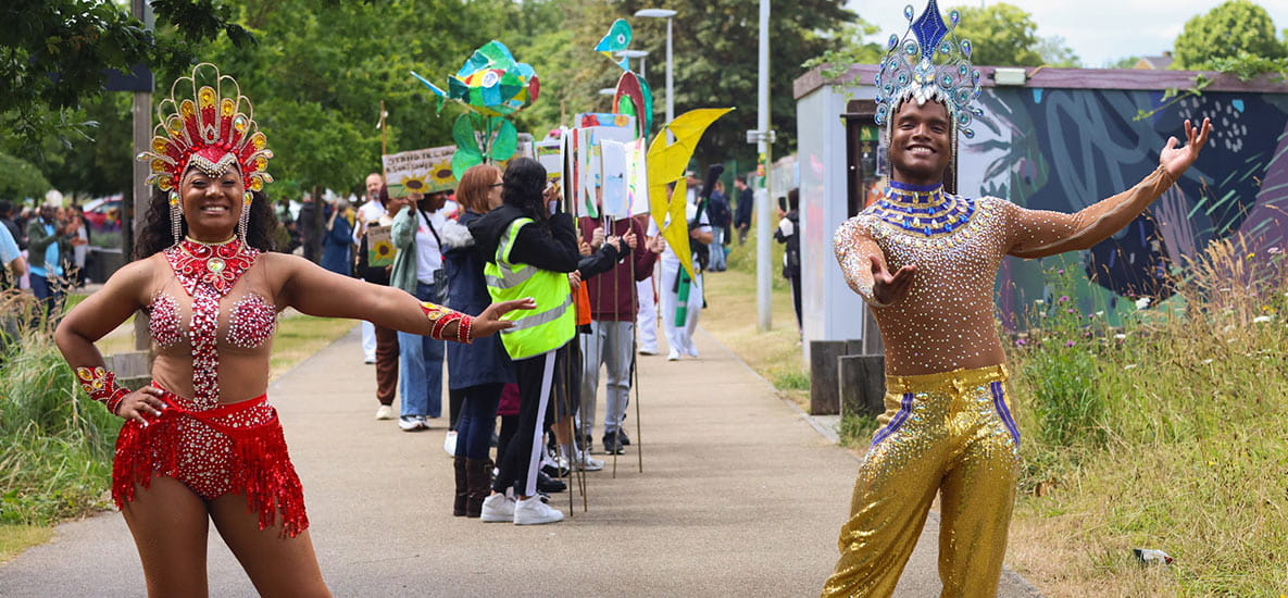 Image of the community carnival dancers posing for an image at Kidbrooke Village