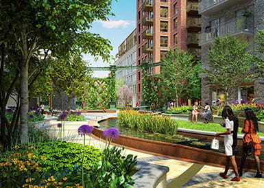 An image of residents at Oval Village enjoying the beautiful open space outside the development