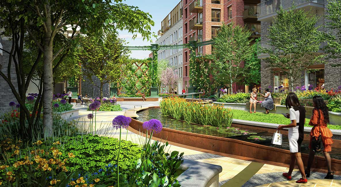 Image of Residents using the open green space around Oval Village development