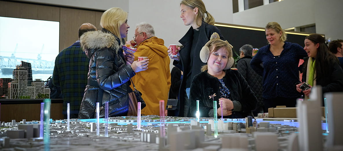 People in the London Dock Sales and Marketing Suite
