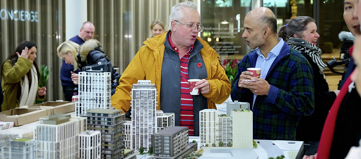 People in the London Dock Sales and Marketing Suite