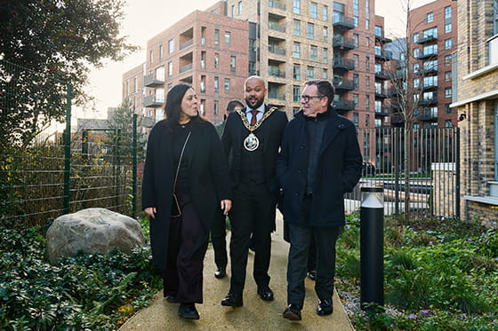 An image of the mayor walking through Alexandra Gate