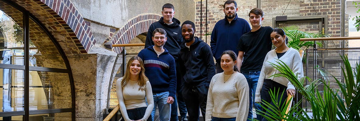 An image of some of the apprentices on stairs