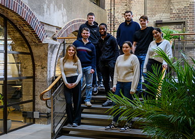 An image of some of the apprentices on stairs