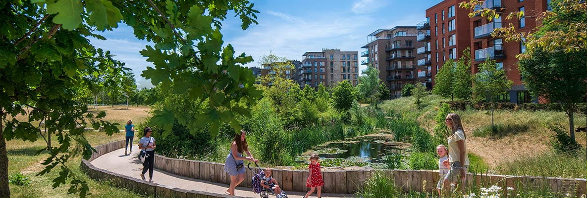 An image of people walking in the Green Space available at Kidbrooke Village