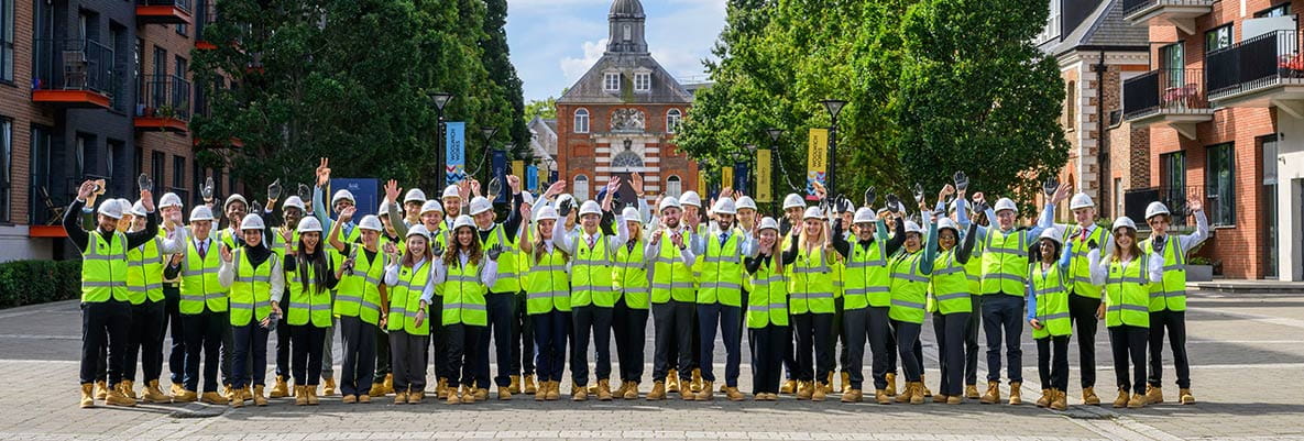 An image of the graduates for the Berkeley Group Graduate Scheme standing in PPE 