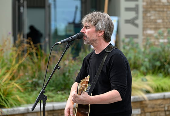 An image of the singer during the live music at Grand Union