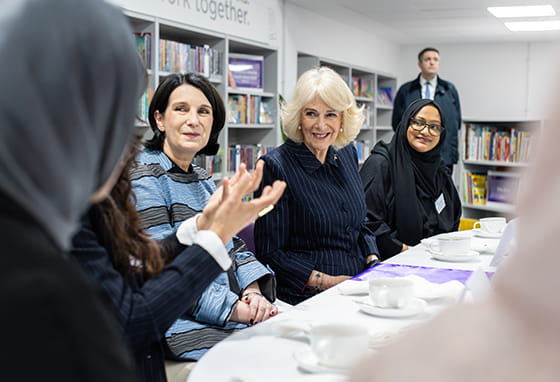 Her Majesty The Queen receiving an introduction to Mulberry Academy