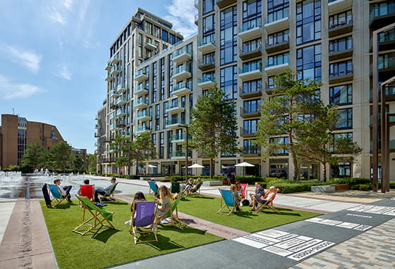 Residents sitting in the community area at London Dock